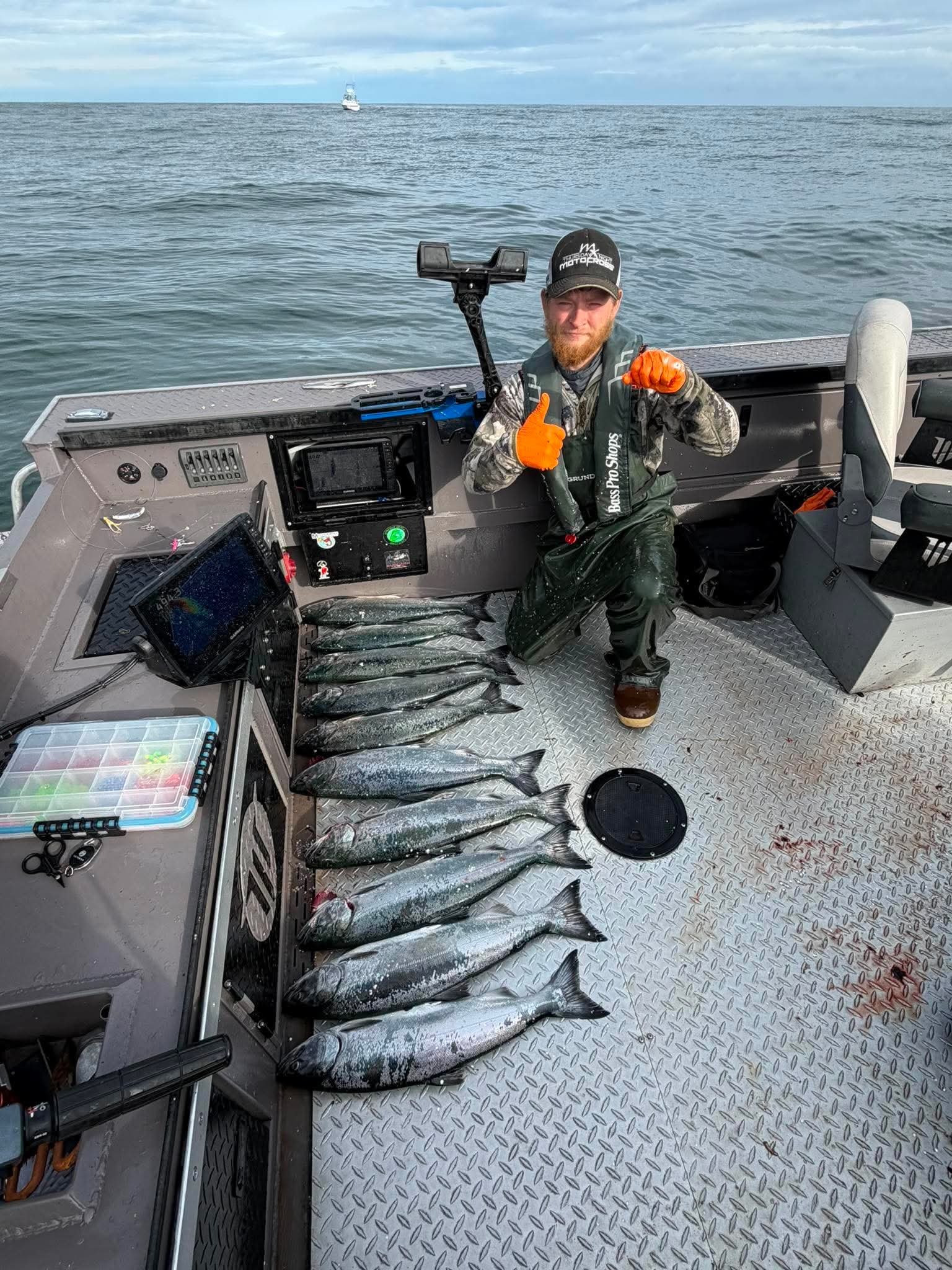 Successful salmon harvest lined across the Fin Addict boat deck